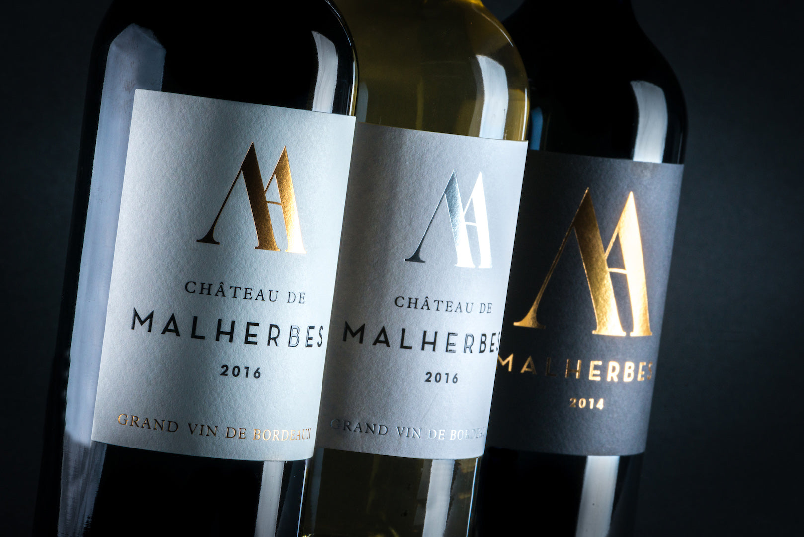 Les trois vins du Château de Malherbes prêts pour une dégustation à notre domaine viticole